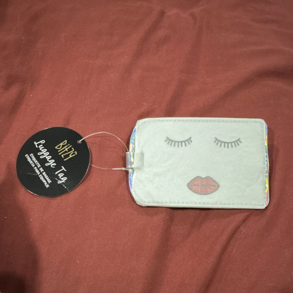 BIZZ Gray Faux Leather Luggage Tag with Face Design
